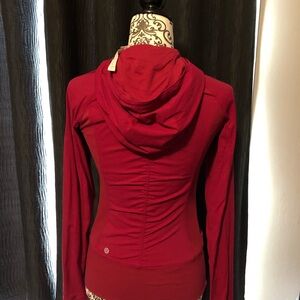Beautiful red/dark wine Lululemon define jacket. Lined only worn several times.